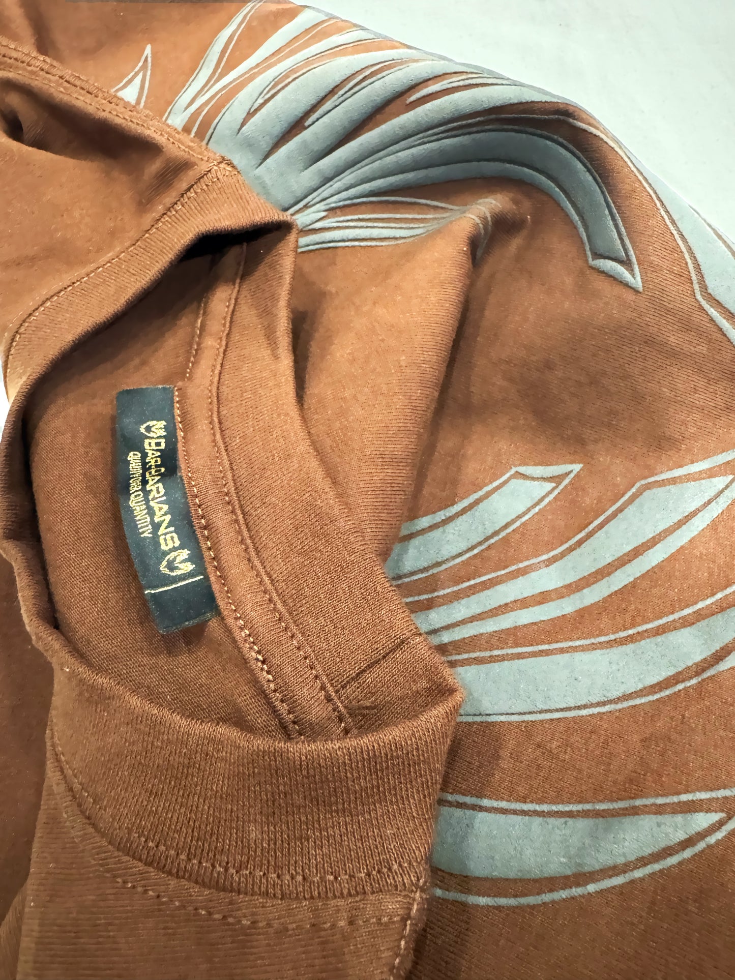 A SIGNATURE GOLD SHIRTS